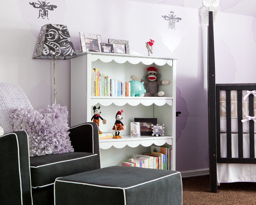 Eclectic Nursery Cairns Example of an eclectic nursery design for girls with purple walls and carpet