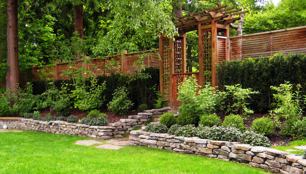 Traditional Landscape by Swick's Organic Landscaping