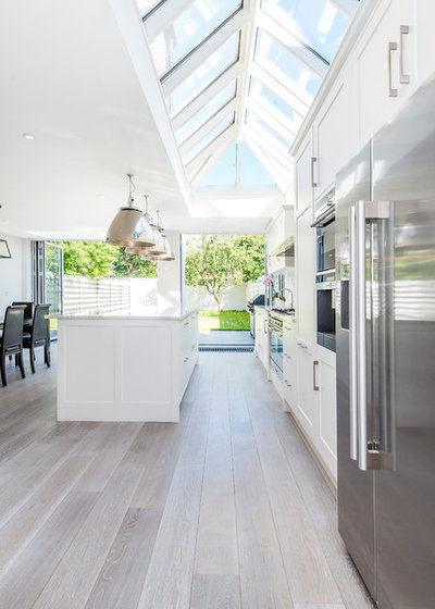 Transitional Kitchen by CATO creative Ltd