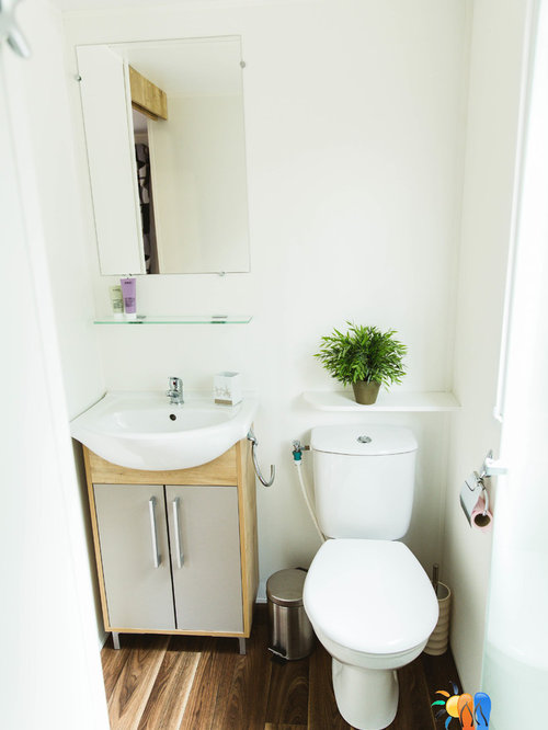 Cloakroom Design Ideas, Renovations & Photos with Dark Hardwood