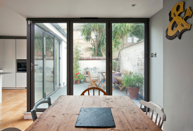 Modern Dining Room by ARCH-angels Architects