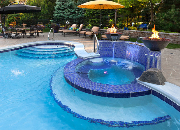 Traditional Pool by Sunset Pools and Spas, Inc.