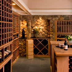 Modern Wine Cellar Glasgow Stone ladened entrance into the wine tasting and entertaining area of this large residential wine cellar.