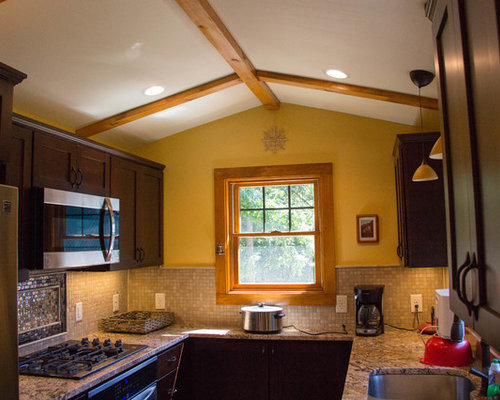 With Laminate Countertops Black Cabinets And Dark Wood Cabinets ...