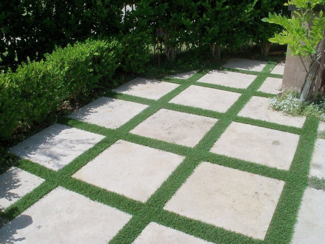 by EcoWorkz Synthetic Grass & Interlocking Pavers