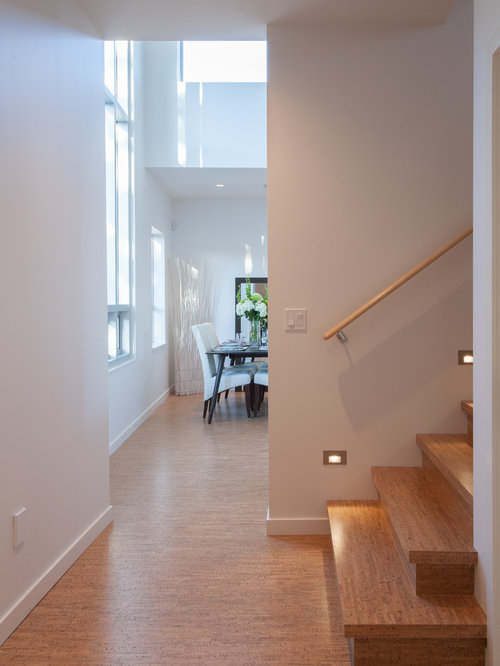 Contemporary Hall Cork Trendy hallway photo in Vancouver with white walls and cork floors