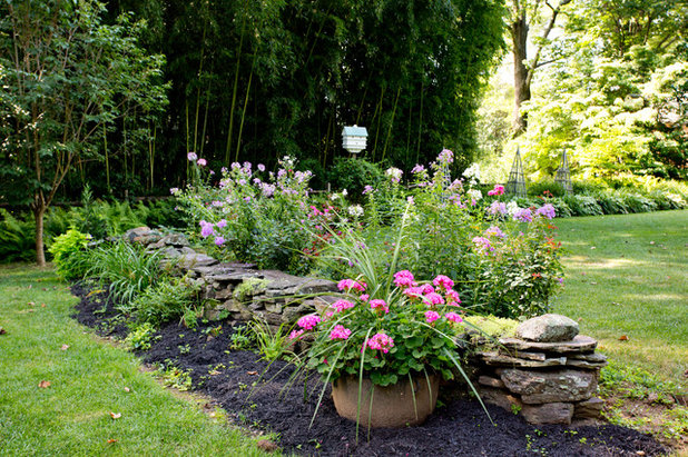 Traditional Exterior by Rikki Snyder