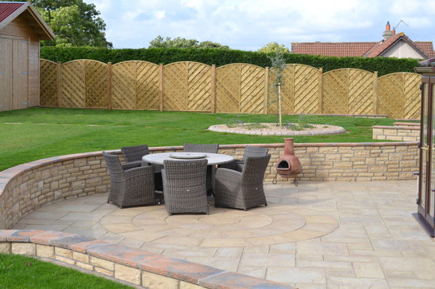Traditional Patio by Gardens Galore