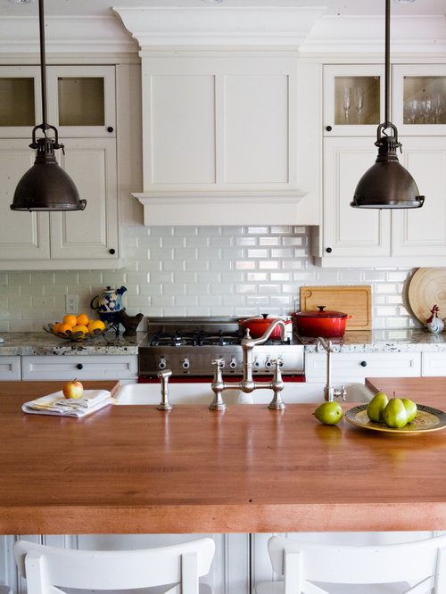 Minimalist White Kitchen Cabinets Subway Tile Backsplash with Simple Decor