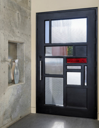 Modern Entrance by Elevation Architects
