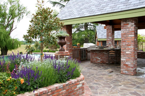 Eclectic Patio by CLK Construction