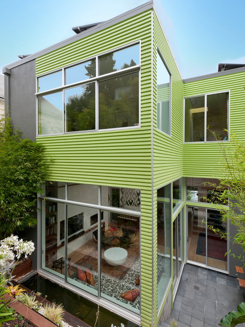 Green Exterior Design Ideas, Renovations & Photos with a Flat Roof
