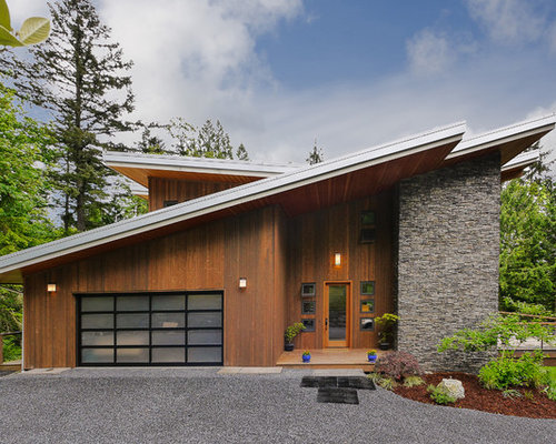  contemporary exterior in Seattle with wood siding and a shed roof
