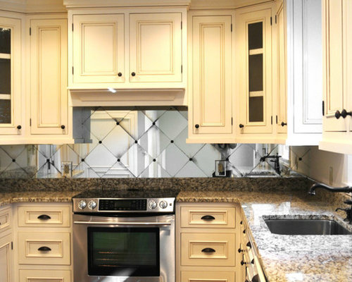 Traditional Cream-Colored Shaker Style Cabinets