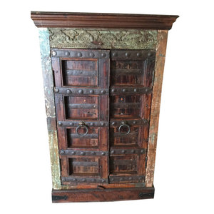 Mogulinterior - Consigned Home Decor Armoire Cabinet Reclaimed Antique Vintage Patina Storage - Dark Brown Rich with culture the cabinet doors belong to the British raj as well as imbibes the rustic charm from old India.The carving on the cabinet door are door from the tradition of vastu culture which is the Indian art of the interior design . This amazing furniture is made of reclaimed shutters and antique elements from Jodhpur, Rajasthan, India!