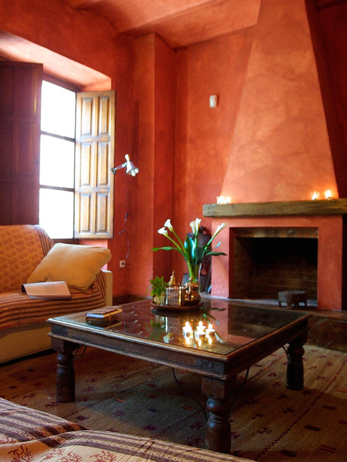 Rustic Living Room Design Ideas, Renovations & Photos with Red Walls