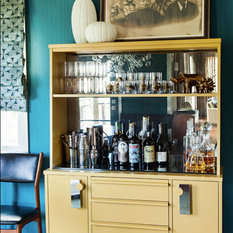 Eclectic Home Bar Belfast I found this Mid-Century bar in thrift store and had it lacquered this punchy mustard color. The color really pops off of this teal striated wallpaper.