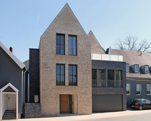 Braunes Haus und Fassade mit Backstein-Fassade: Ideen für die