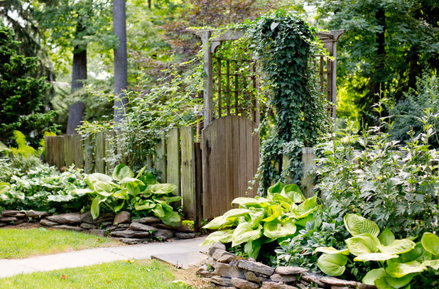 Traditional Exterior by Rikki Snyder