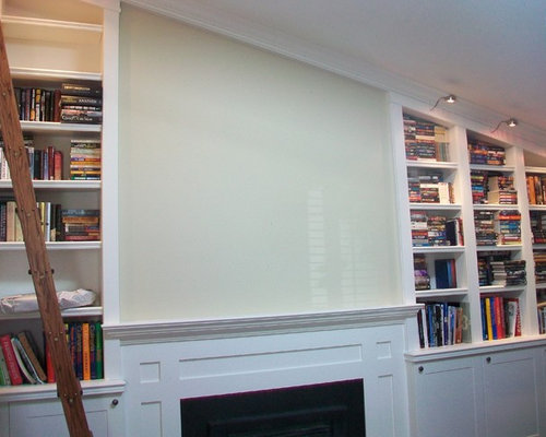 Built in Bookcases With Rolling Library Ladder
