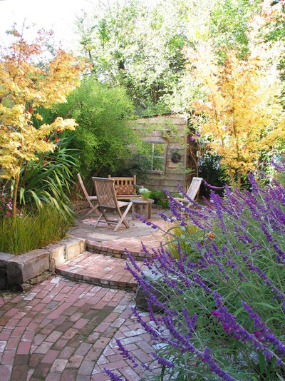 Traditional Landscape by InsideOut Design, Inc