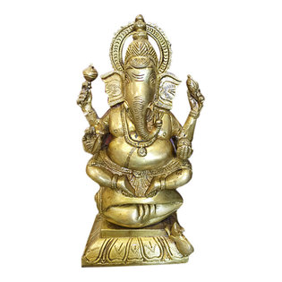 Mogul Interior - Lord Ganesha Sculpture Hindu Ganesh Brass Statues- God of Success - Ganesh is seated on chowki with his vahana or vehicle, a rat ,with both legs tucked underneath him. He holds a noose, elephant goad, his broken tusk and a mango. Ganesh's trunk is to his left. In sculpture the position of Lord Ganesh's trunk has a symbolic meaning. If the trunk turns to the Ganesh's left, that is the direction for success in the world. It is a position associated with grihastas, or householders.