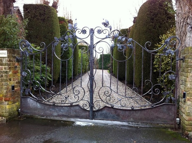 Traditional Garden by Adrian Payne sculpture and Ironwork