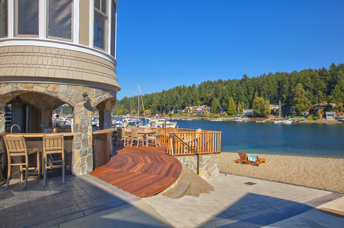 A custom deck provides a central entertaining area