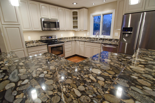 Hot Pots Other Minerals Hot Pans Large Slabs Stain Resistant Countertop Expert Granite vs Earth's Crust Minor Scratches Silicon Crystallizes Hot Pads Focal Point Engineered Product
