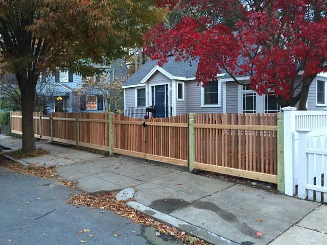 Fencing And Gates Jamaica  Jamaica Plain  Custom Red Cedar Spindle Picket w/ Scallop Gates traditional-landscape