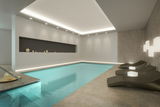 Basement swimming pools with swim currents expand the use of your pool for swimming
