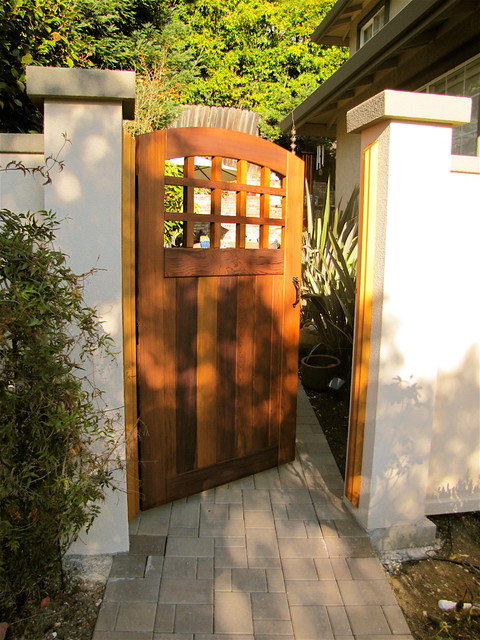 Archtop Portland Side gate in stucco wall - Traditional - Home Fencing