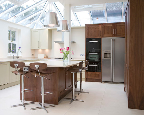 Contemporary kitchen with beige quartz countertops