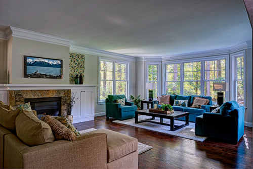 Family Room with Fireplace and Wall of Windows