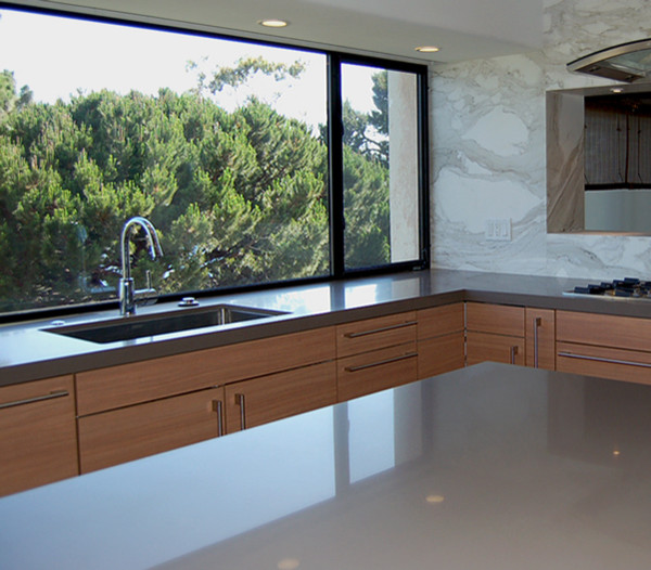 quartz counter linear island Contemporary Kitchen Orange County