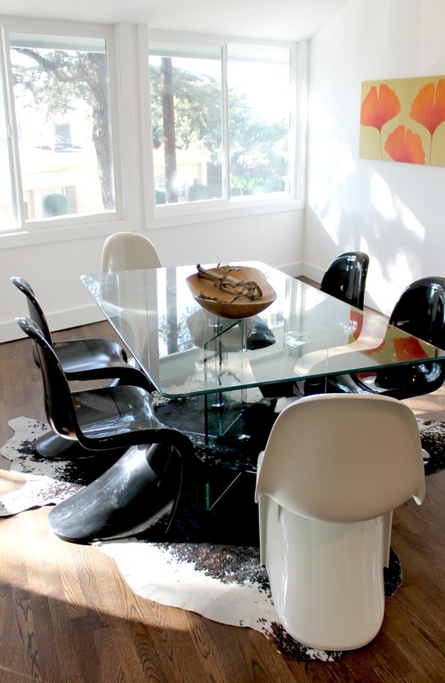 Panton S Chairs, Glass Dining Table, Cowhide Rug