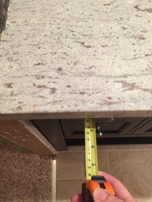 Granite countertops installed with too much overhang