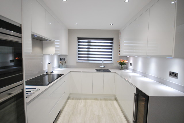 White Gloss J Pull Contemporary Kitchen With Light Grey Quartz Worktop