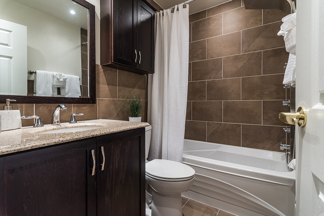  the colors in this bathroom. The browns and whites are very striking