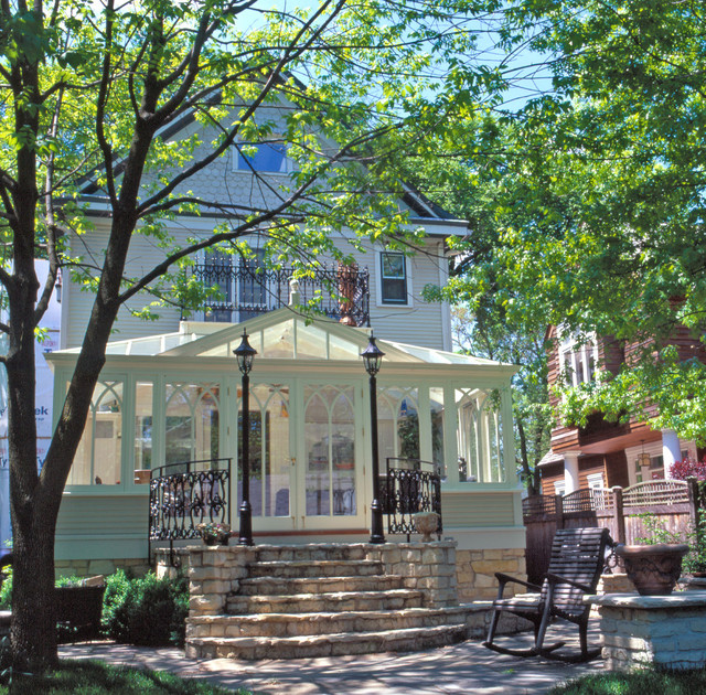 Conservatory with second floor balcony Traditional Greenhouses