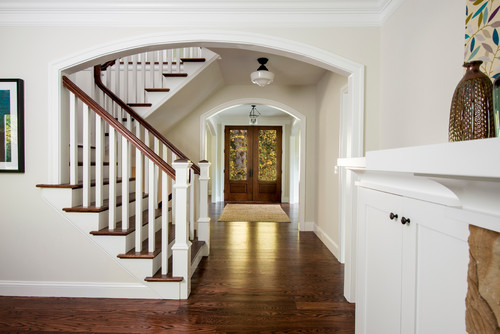 Double Door Entry with Wood Rail Staircase