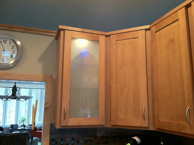 Angled wall cabinets in each corner added definition and impact