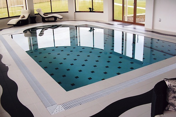 Contemporary Pool Wales Swimming pool wavy tile surround in North Wales contemporary-pool