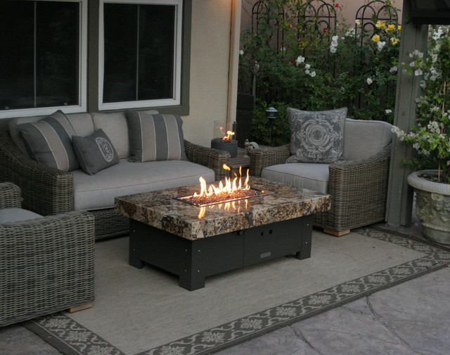 Balboa Fire pit table by COOKE - Eclectic - Patio - orange ...
