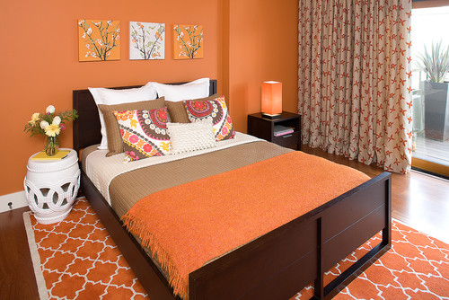 Hillside Sanctuary:  Tangerine guest bedroom by Kimball Starr Interior Design