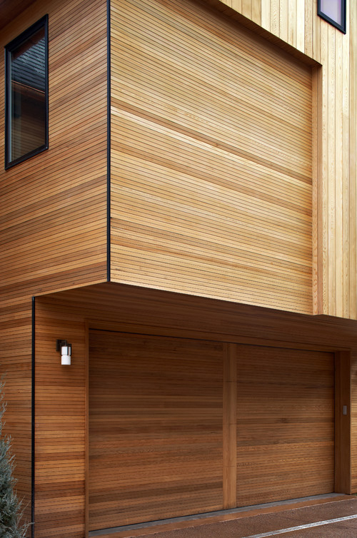 Wood-grained garage doors 