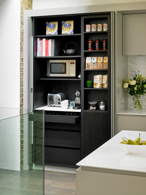 Breakfast cupboard with retractable doors
