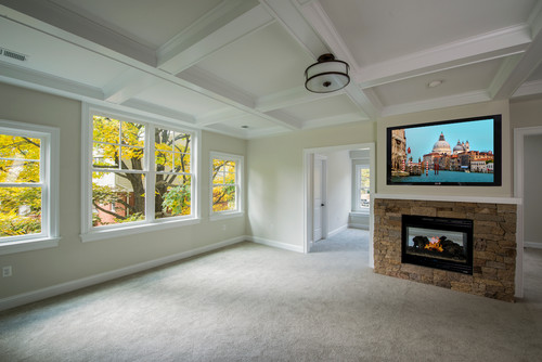 Master Bedroom with Coffered Ceilings and Double Sided Fireplace