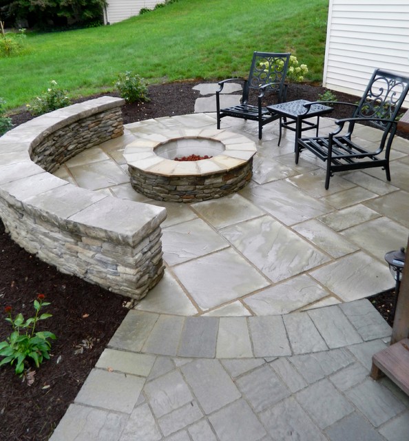 Patio under deck with separate firepit patio. Contemporary Patio