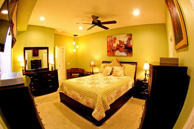 Inspiration for a mid-sized timeless master carpeted bedroom remodel in San Diego with green walls and no fireplace